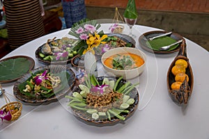 Tradition Northern Thai food. on a wooden table, Set of Thai food popular menu.