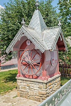 Tradition wooden building for water well in Bucovina, Romania