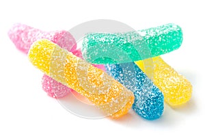 Traditional acidulated candies on white background