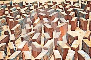traditional adobe bricks drying in sun