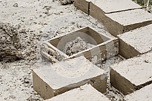 Traditional adobe mud bricks in Paru Paru Community Village