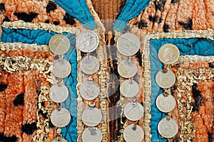 Traditional Afghani waistcoat decorated with old coins photo
