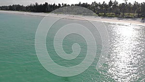 Traditional Africal Sailboat at Zanzibar island Paje beach in blue Indian ocean aerial view. Unguja, tanzania