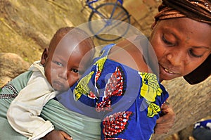 Traditional african women with baby on the back