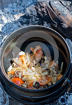 Traditional Afrikaner cooking method outdoors