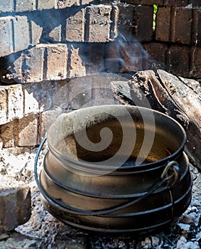 Traditional Afrikaner cooking method outdoors