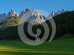 Traditional alpine St Johann church in Val di Funes valley, Santa Maddalena. Dolomites, Italy, Europe