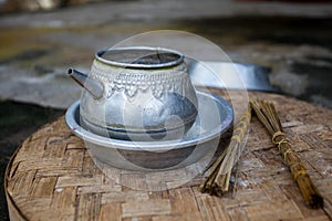 Traditional aluminum kettle for ceremonies in the temple