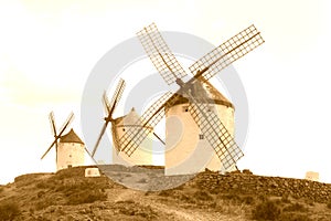 Traditional ancient windmills along the Don Quichot route, Consuegra, Spain photo