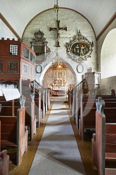 Traditional antique norwegian interior stone church. Luster. Travel Norway.