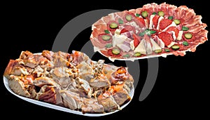 Traditional Appetizer Savory Dish Meze with Freshly Spit Roasted Gourmet Crunchy Crackling Pork Meat Isolated on Black Background