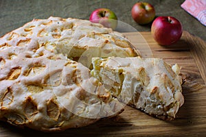 Traditional apple pie baked in a home oven.