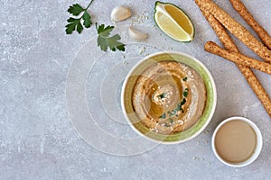 Traditional arabian eggplant hummus baba ganoush wit ingredients. Middle Eastern cuisine. Top view, overhead