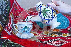 Traditional Arabic cappuccino jug in the shape of a camel, dromadaire. photo