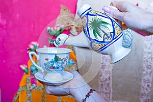 Traditional Arabic cappuccino jug in the shape of a camel, dromadaire. photo