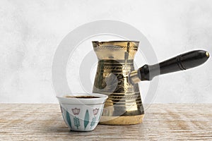 Traditional Arabic Coffee Mug and Coffee Cup, Turkish Coffee isolated on white, Clipping path