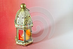Traditional arabic lantern lit up for celebrating holy month of Ramadan