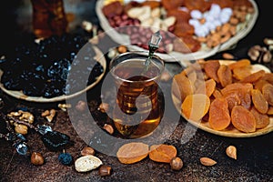 Traditional Arabic tea with dried fruits , nuts and tea