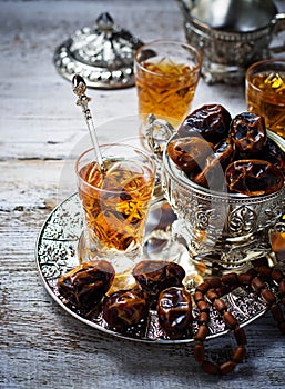 Traditional arabic tea and dry dates