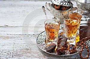 Traditional arabic tea and dry dates