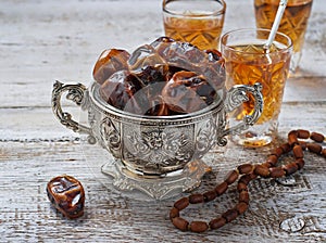 Traditional arabic tea and dry dates