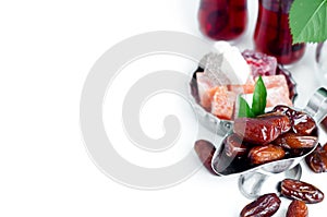 Traditional arabic tea set and dried dates.