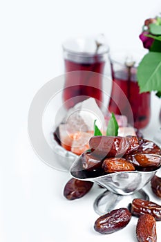 Traditional arabic tea set and dried dates.