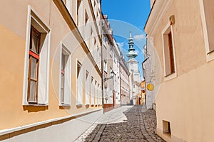 Building St. Michael tower and narrow street at foreground in Bratislava, Slovakia