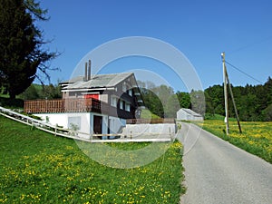 Traditional architecture and farmhouses on the slopes of the Alpstein massif and in the Rhine valley Rheintal, Gams