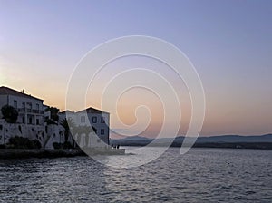 Traditional architecture in Spetses seafront, Greece.sunset - stock photo