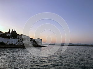 Traditional architecture in Spetses seafront, Greece. sunset- stock photo