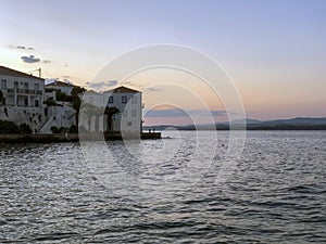 Traditional architecture in Spetses seafront, Greece. sunset- stock photo