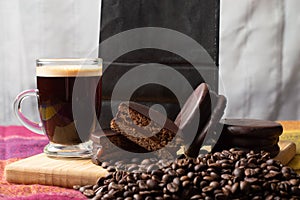 Traditional Argentinian alfajores with Espresso and coffee beans