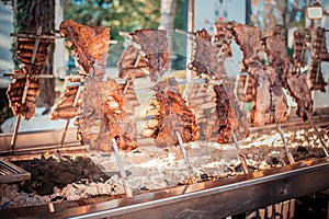 Traditional Argentinian asado roasted lamb grilled meat. photo