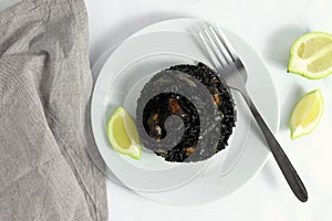 Traditional arroz negro - arrÃÂ²s negre - black rice dish, typical for Valencia