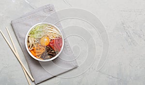 Traditional Asian Bibimbap dish with rice and vegetables