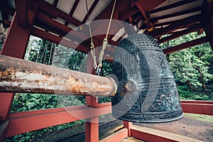 Traditional asian big ceremony bronze bell in temple.