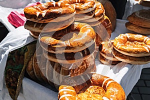 traditional Asian bread kazakh tandoor flatbread on counter at bazaar in Kazakhstan