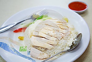 Traditional Asian Chinese Street Food: Khao Man Kai Kao Man Gai is Hainanese chicken rice, steamed chicken meat and white rice.