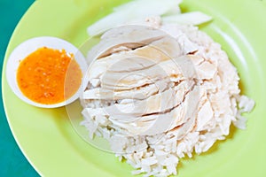 Traditional Asian Chinese Street Food: Khao Man Kai Kao Man Gai is Hainanese chicken rice, steamed chicken meat and white rice.