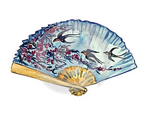 Traditional Asian fan with cherry blossom and flying swallows on blue sky background