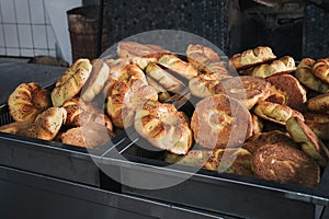 traditional Asian flatbread on counter in the bakery. Traditional Uzbek bread in Tashkent in Uzbekistan