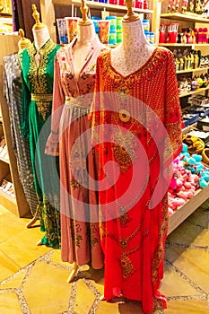 Traditional asian woman dresses Souk Madinat Jumeirah Dubai UAE