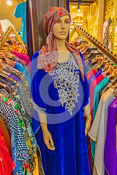 Traditional asian woman dresses Souk Madinat Jumeirah Dubai UAE