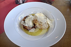 Traditional Austrian dumplings with butter and cheese