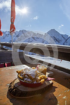 Traditional austrian pancakes on a winter terrace