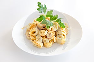 Traditional Austrian soup dish called fries isolated on a white plate