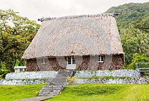 Traditional authentic fijian Bure, wood-and-straw thatched walls, roof hut. Levuka town, Ovalau island, Lomaiviti. Fiji, Oceania.