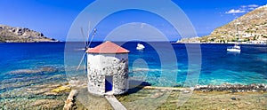 Traditional authentic Greece - beautiful island Leros in Dodecanese, view with old windmill over the sea