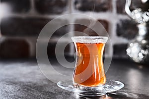 Traditional Azerbaijani or Turkish aromatic tea in an armudu cup